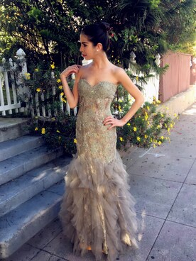 Claire Harper Flood is wearing Jovani "absolutely gorgeous Jovani gown - only own once. been hanging in a garment bag in my closet for years. sequin, appliqué and lace with a silk underlay. chiffon ruffles at the bottom."