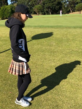 SHiORi is wearing New Balance Golf