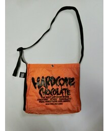 ハードコアチョコレート | フルメルティッドロゴ サコッシュ(牛丼オレンジ)(ショルダーバッグ)