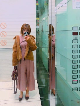 「HOWL（ハウル）のアイテム」を使った、Jennie Liuさん（レディース・166cm）の冬コーディネート