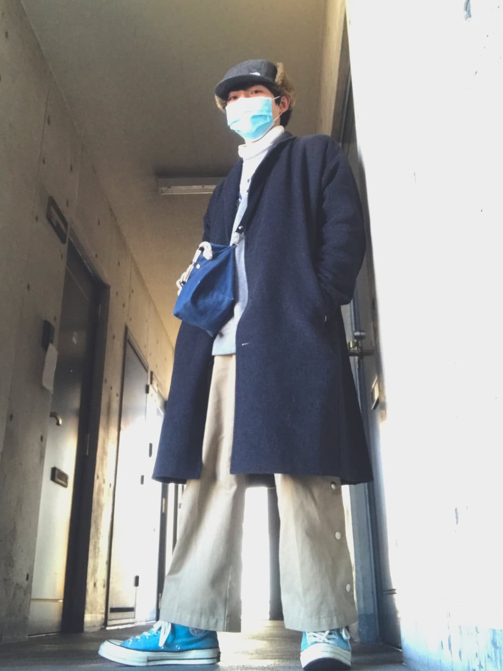 「低身長、THE NORTH FACE、ロングコート、CT70s、converse、フライトキャップ、冬コーデ、Dickies」｜「THE NORTH FACEの【THE NORTH FACE/ザ・ノース・フェイス】 Badland Cap:キャップ◆（キャップ、ブラック系）」を使った、wanさん（メンズ・167cm）の冬コーディネートの1枚目の写真