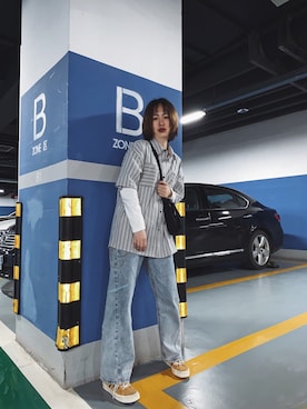 「VANS（バンズ）のアイテム（ショルダーバッグ、ブラック系）」を使った、哦lily啊さん（レディース・165cm）の春コーディネート