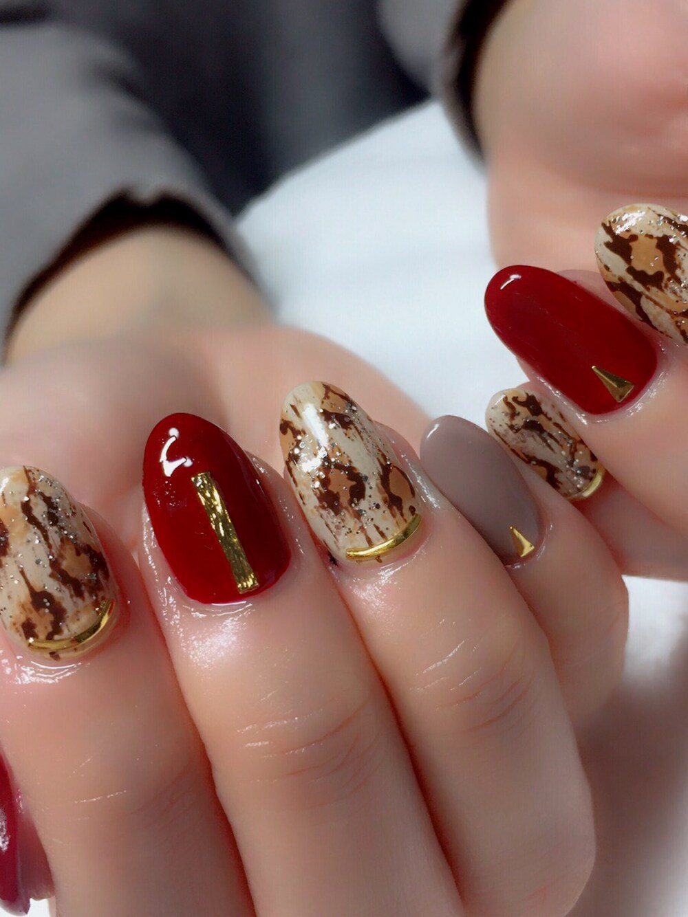 「ひょう柄、秋ネイル」｜「NAILSのアイテム（その他、レッド系）」を使った、ミーさん（レディース・159cm）の冬コーディネートの1枚目の写真
