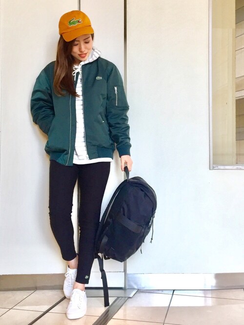 RIKA is wearing LACOSTE "カツラギ刺繍6方キャップ"