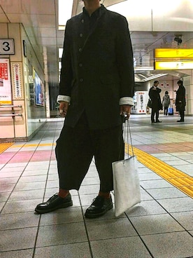 「Kagari Yusuke（カガリユウスケ）のアイテム（バッグ）」を使った、saryoさん（メンズ・176cm）の冬コーディネート