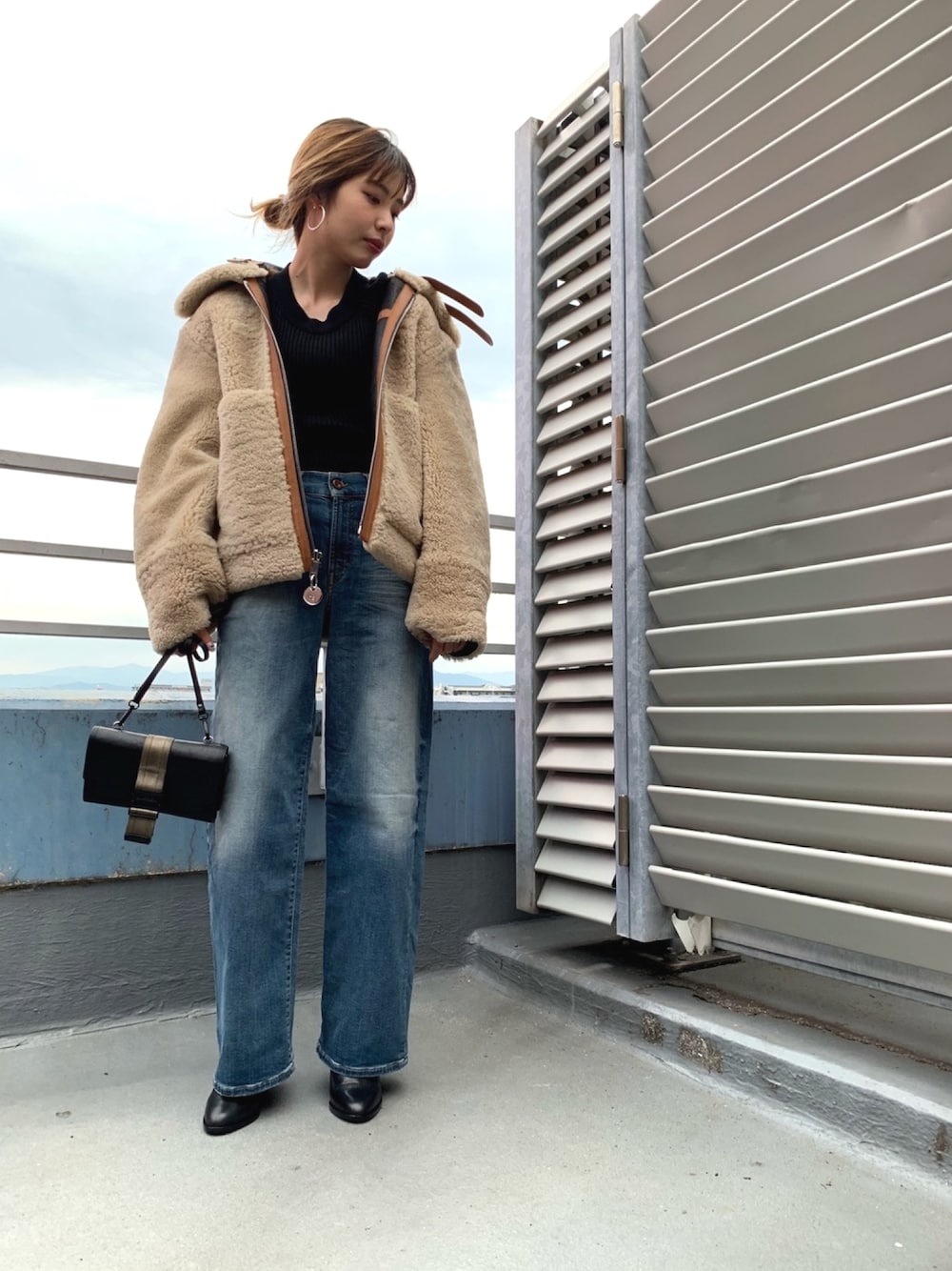 DIESELのムートンコート（ブラック系）を使った人気ファッション