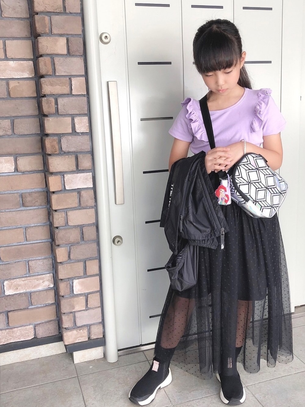 「韓国子供服、キッズコーデ、休日スタイル、女の子コーデ、パープル×黒、女の子、9歳」｜「THE NORTH FACEのアイテム（マウンテンパーカー、ブラック系）」を使った、lotus1220さん（キッズ・135cm）の秋コーディネートの1枚目の写真