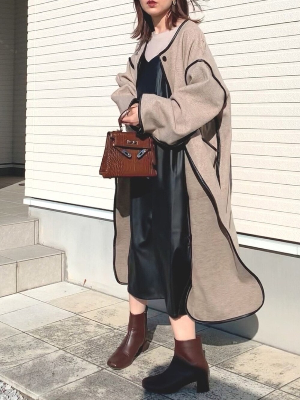 紗衣さんの「エコレザーキャミワンピース×長袖ロングTシャツ（Toyome）」を使ったコーディネート