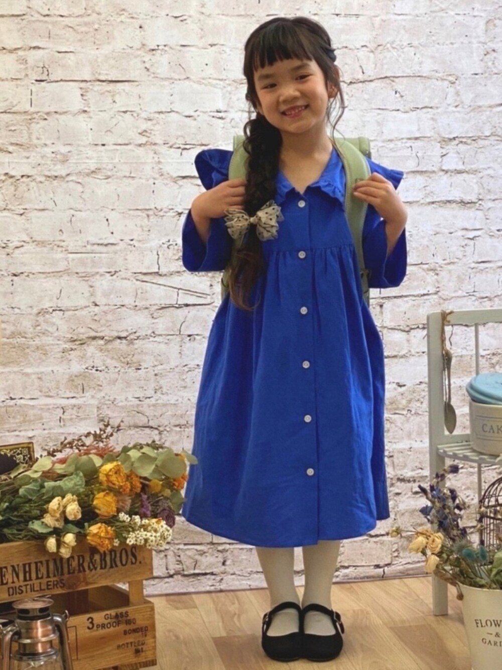 「キッズファッション、キッズコーデ、女の子コーデ、入学、もうすぐ小学生、春、ワンピース、ランドセル、土屋鞄」｜「LOWRYS FARMのメンアサフリルカラーワンピース　931325（ワンピース、ブルー系）」を使った、nikoさん（キッズ・110cm）の春コーディネートの1枚目の写真
