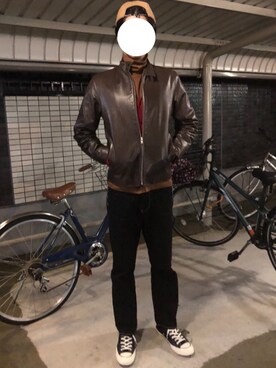 COACHのライダースジャケット（ブラウン系）を使った人気ファッション 