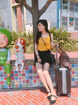 Liz  Huangさんのコーディネート