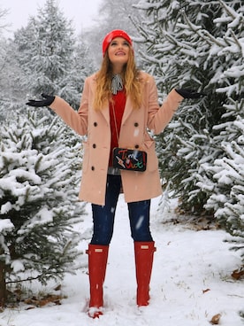 Kathleen Harper is wearing HUNTER "Hunter 'Original Tall' Rain Boot (Women)"