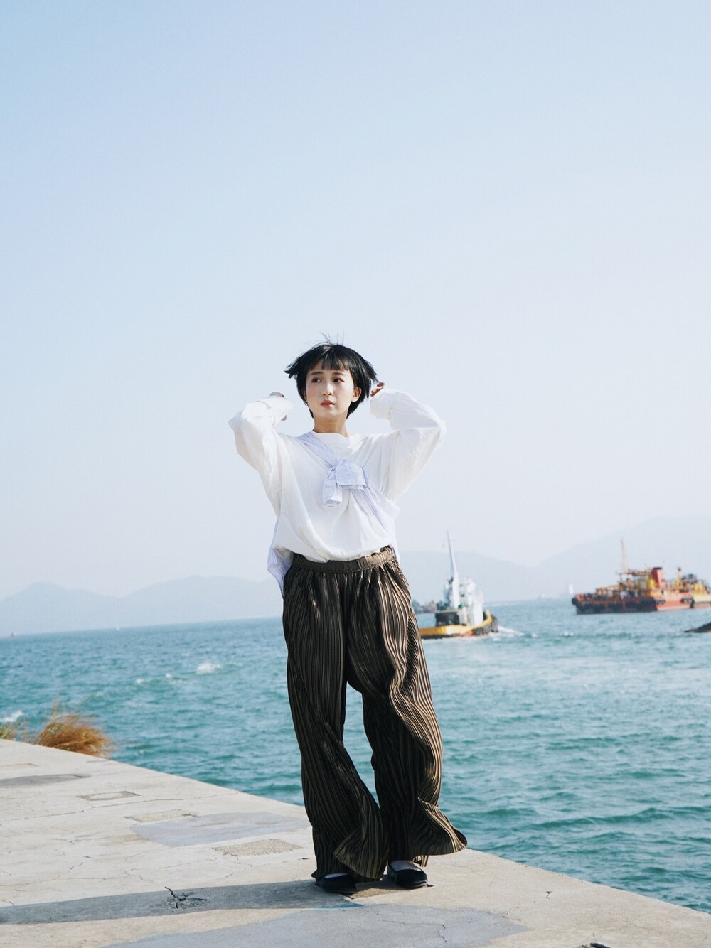 「ootd、海、日系極簡、休閒」｜「niko and...のアイテム（パンツ、ブラウン系）」を使った、Cyariさん（レディース・156cm）の冬コーディネートの1枚目の写真