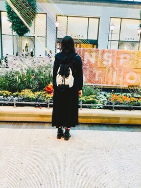 Xinyi Liさんのコーディネート