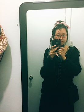 Xinyi Liさんのコーディネート