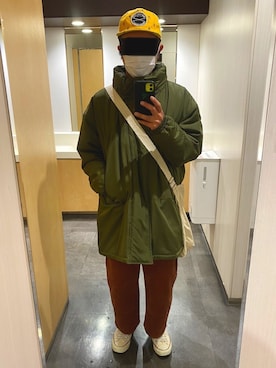 「OMNIGOD（オムニゴッド）のアイテム（バッグ）」を使った、タニさんさん（メンズ・169cm）の冬コーディネート