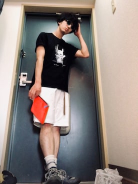 COMME des GARCONSのクラッチバッグを使った人気ファッション