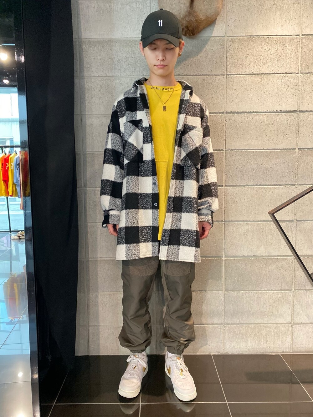 「チェック、NIKE、キャップ、ビックシルエット、11by boris bidjan saberi、KaneZ、秋コーデ、WHITELAND BLACKBURN、お洒落さんとつながりたい、PALM ANGELS」｜「Palm Angelsのアイテム（Tシャツ/カットソー、イエロー系）」を使った、𝐊𝐚𝐢𝐭𝐨さん（メンズ・180cm）の秋コーディネートの1枚目の写真