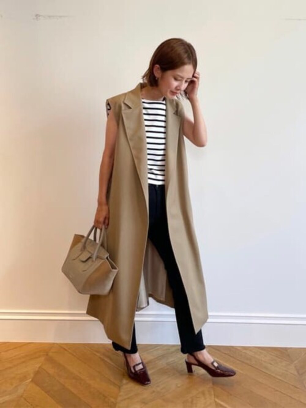 「ジレ、ボーダートップス、秋服、ジレスタイル、フレアデニム、秋服コーデ、allureville、アルアバイル、ファー付きジレ」｜「allurevilleのファーカラージレ（ベスト、ベージュ系）」を使った、tanakaさん（レディース・159cm）の秋コーディネートの1枚目の写真