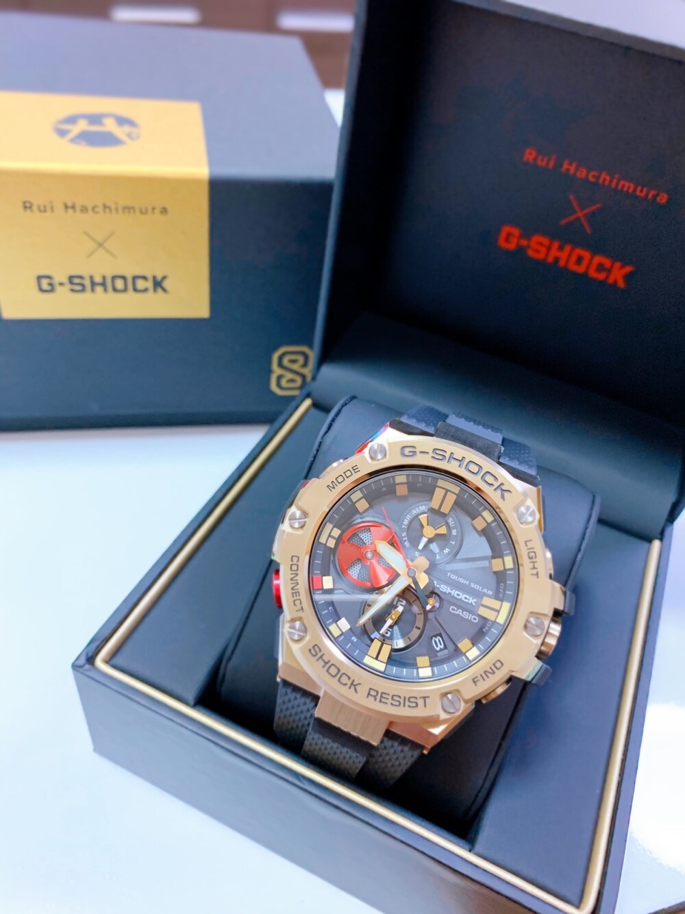 「G-SHOCK、八村塁モデル、NBA、ワシントン・ウィザーズ、バスケットボール、八月八日発売、末広がり」｜「G-SHOCKのアイテム（アナログ腕時計、ゴールド系）」を使った、yasucocoさん（メンズ・172cm）の夏コーディネートの1枚目の写真