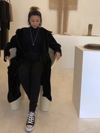 Rita Liu is wearing CONVERSE
