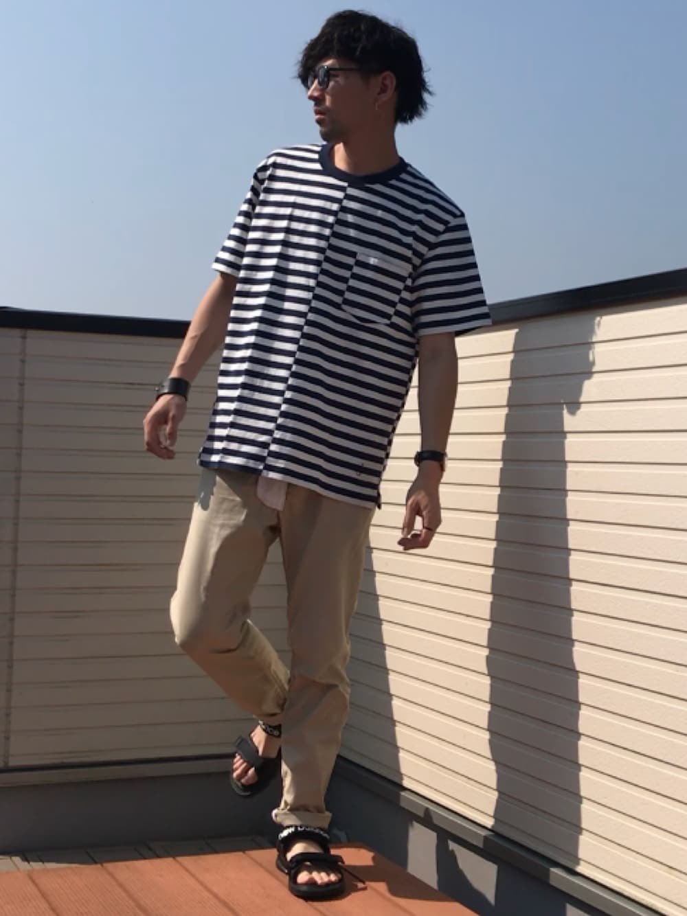 「UNIQLO JW ANDERSON、ボーダー、ボーダーTシャツ、GU、Kim jones、チノパン、スポーツサンダル、シンプルコーデ、ビッグシルエット、いいね、save、フォローお願いします🤑」｜「UNIQLOのアイテム（Tシャツ/カットソー、ホワイト系）」を使った、ファルルさん（メンズ・173cm）の夏コーディネートの1枚目の写真