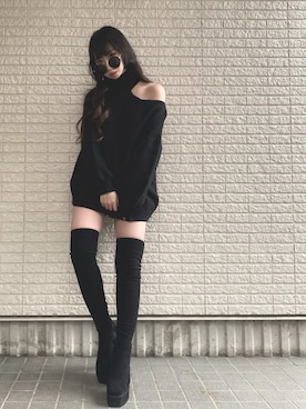 デニムパンツを使った「ニーハイブーツ」の人気ファッション