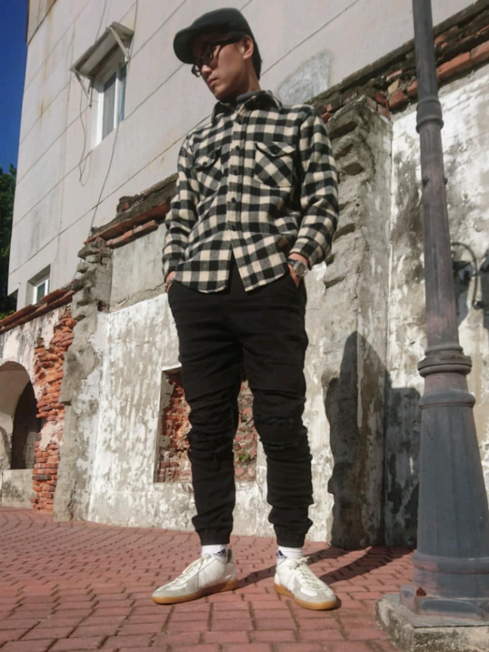 「WOOLRICH、台南、GERMAN TRAINER、德訓鞋」｜「Publish Brandのアイテム（その他パンツ、ブラック系）」を使った、金旺さん（メンズ・179cm）の冬コーディネートの1枚目の写真