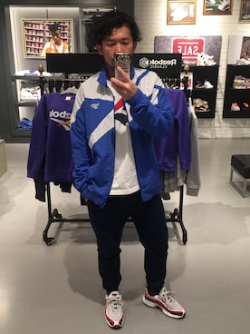 「スタッフコーデ」｜「アイテム（ナイロンジャケット）」を使った、シャーマンキングさん（メンズ・175cm）の冬コーディネート