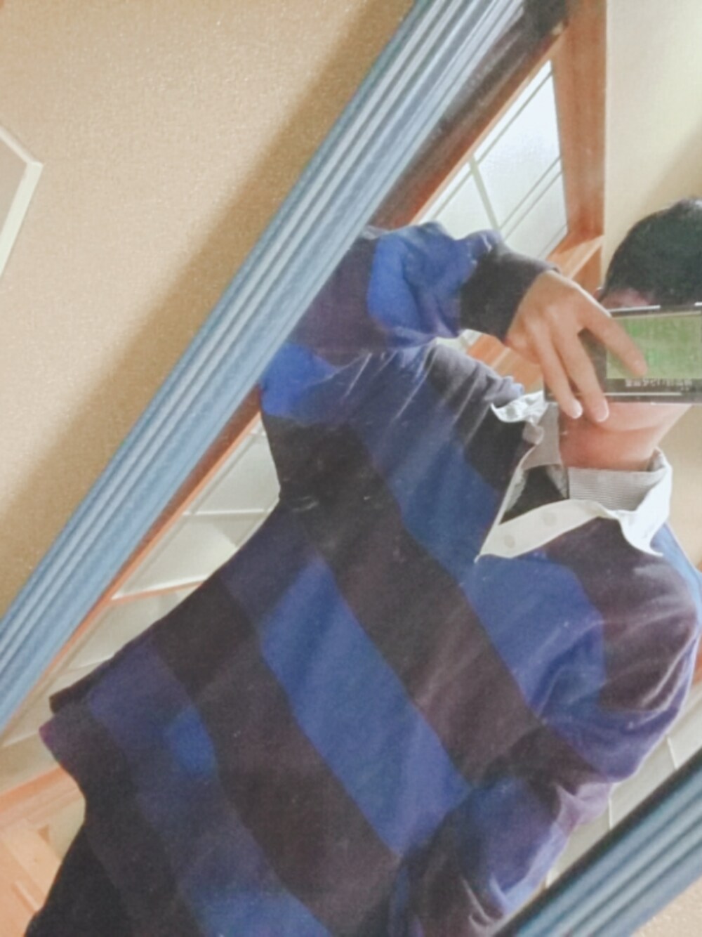 「FILAのアイテム（ポロシャツ、ブルー系）」を使った、仁モンさん（メンズ・165cm）の冬コーディネートの1枚目の写真