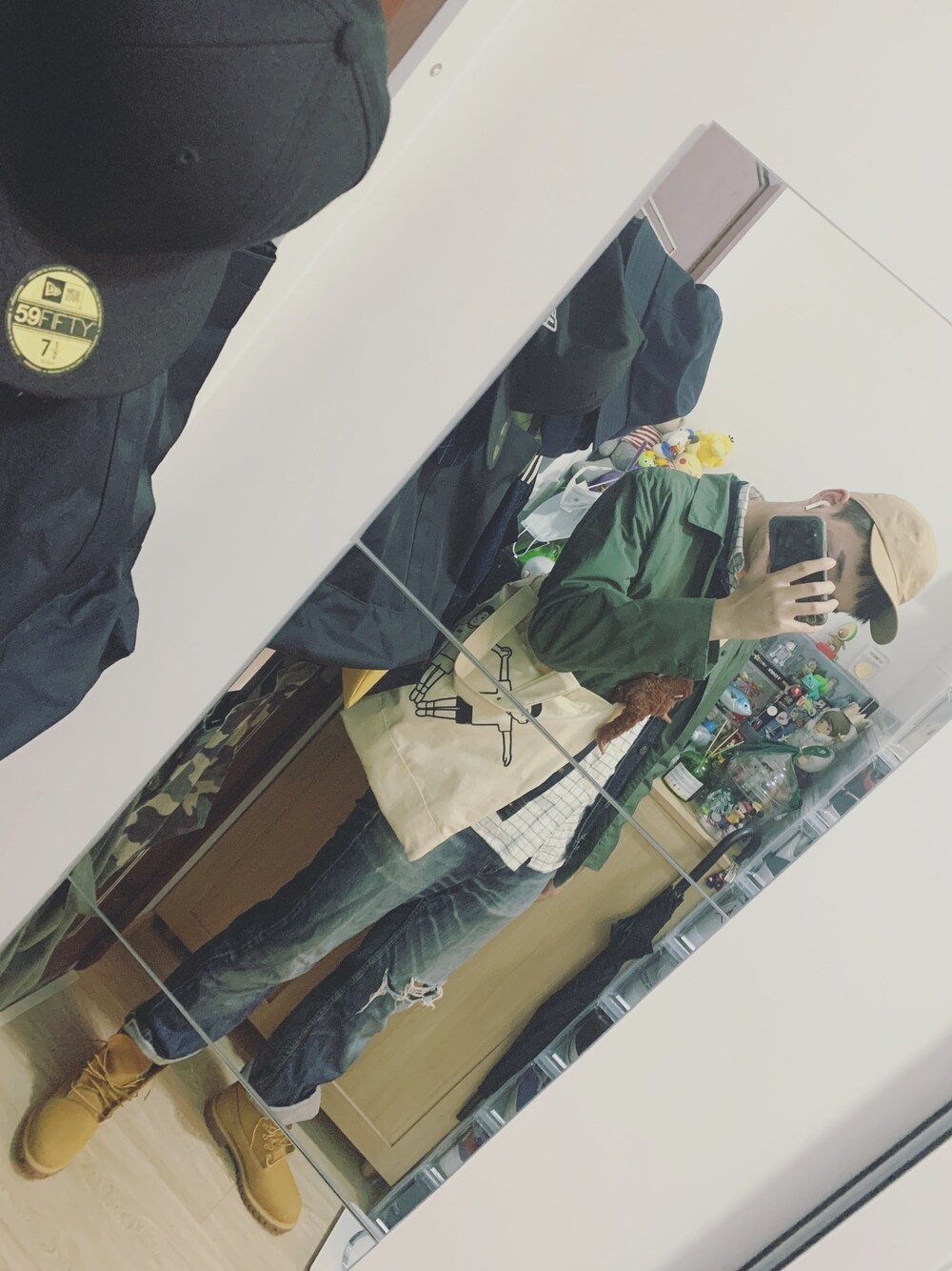 「無印良品のアイテム（ジャケット/アウター、グリーン系）」を使った、张崎霆さん（メンズ・187cm）の冬コーディネートの1枚目の写真