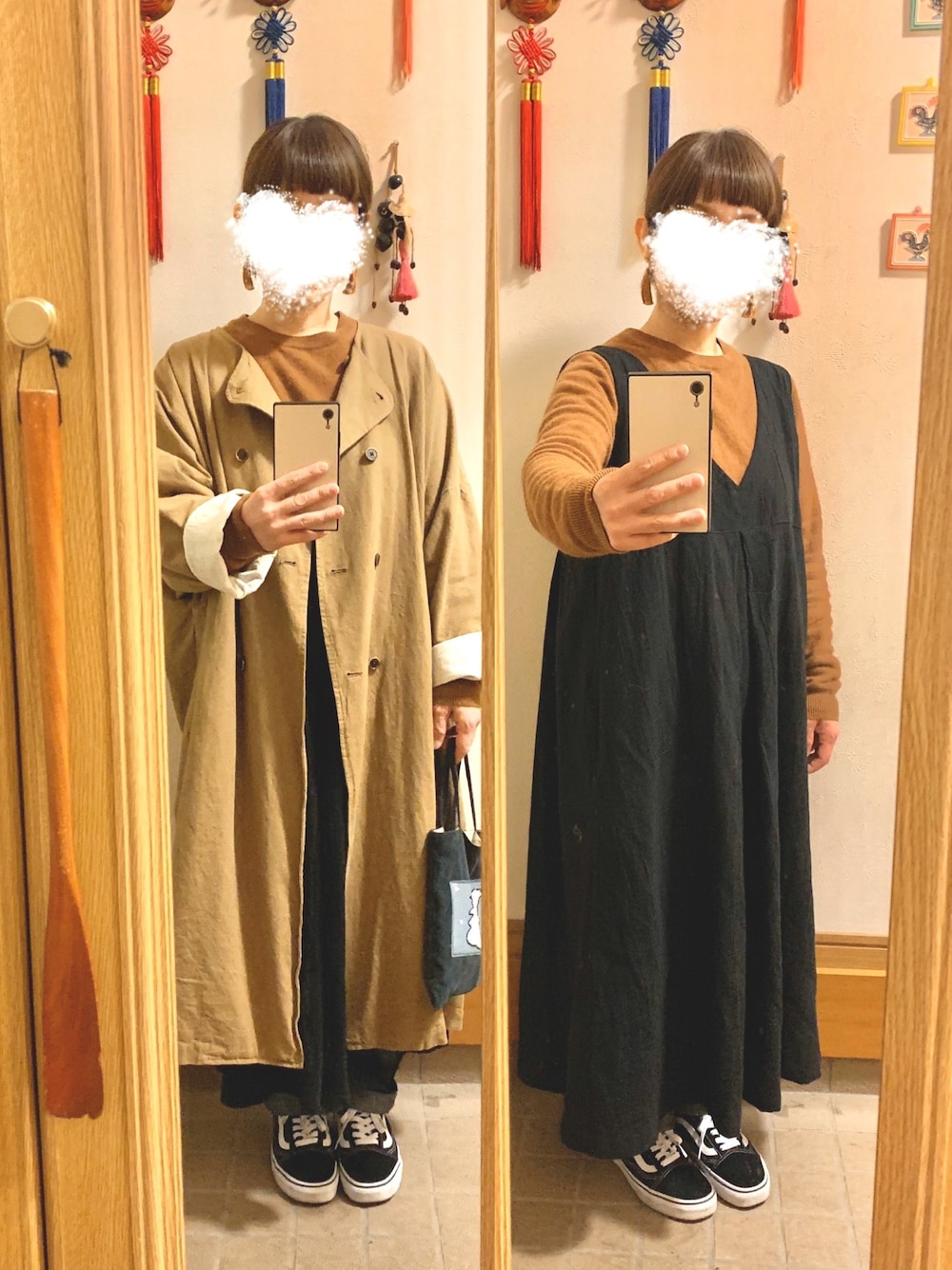 ブラウン系のジャケット/アウター、ブラック系のジャンパースカート、ブラウン系のニット/セーターを着用したレディースの冬コーディネートの1枚目の写真