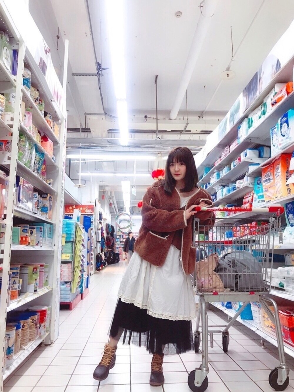 「大潤發、冬、雨、熊」｜「LOVFEEのアイテム（その他アウター、ブラウン系）」を使った、erika shihさん（レディース・160cm）の冬コーディネートの1枚目の写真