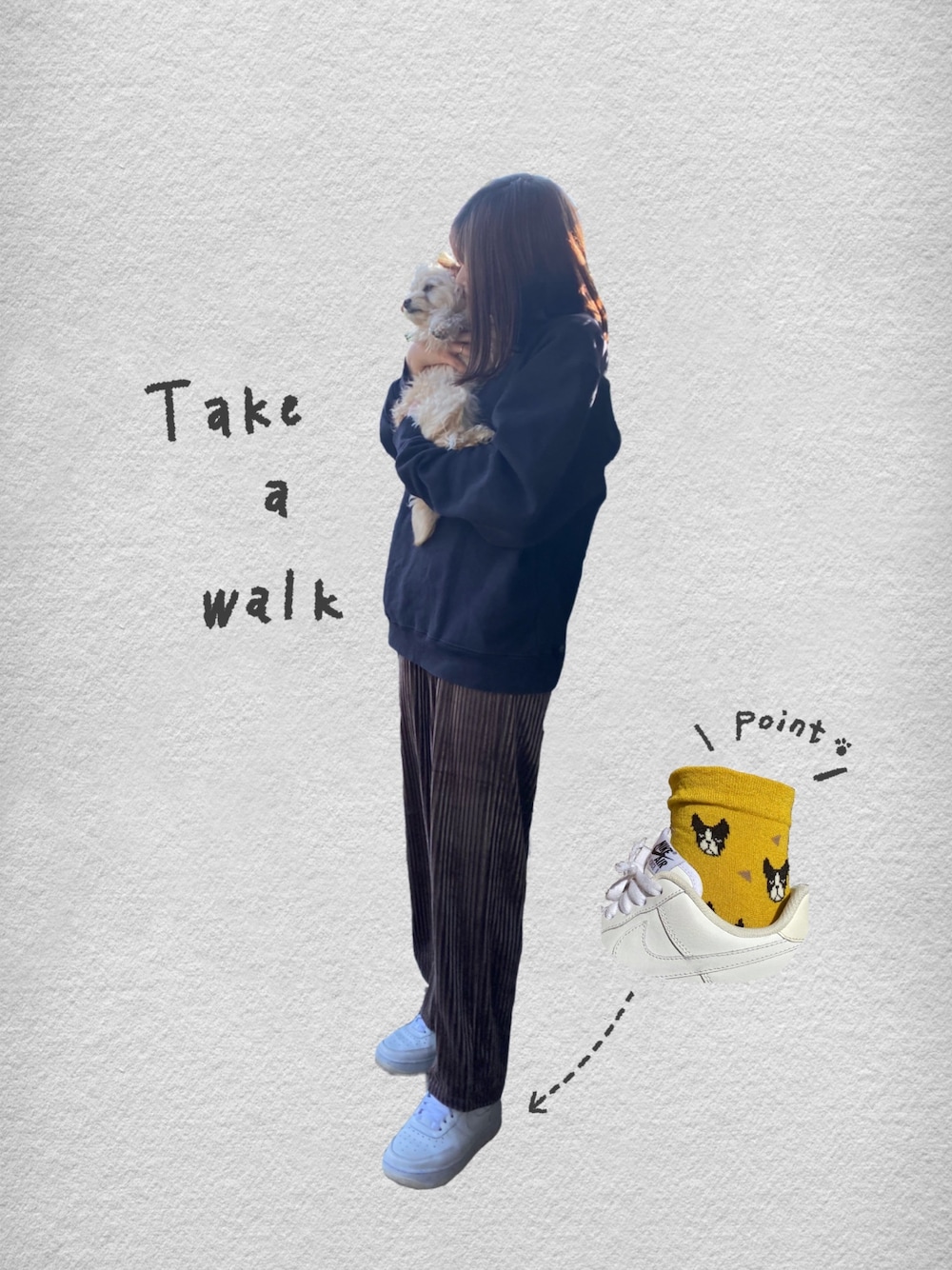 ブラック系のスウェット、ホワイト系のスニーカーを着用したレディースの冬コーディネートの1枚目の写真