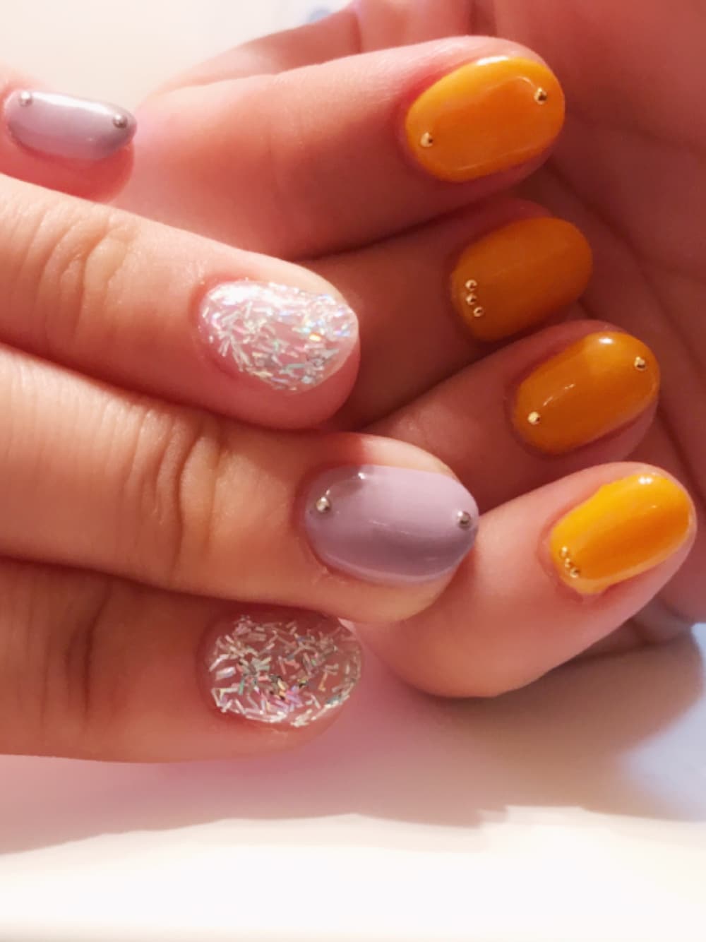 ピンク系のハンドケア/ハンドクリームを着用したレディースの夏コーディネートの1枚目の写真