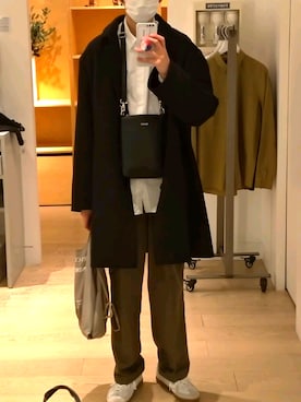 「COS（コス）のアイテム（ステンカラーコート）」を使った、yuuuuuさん（メンズ・180cm）の冬コーディネート