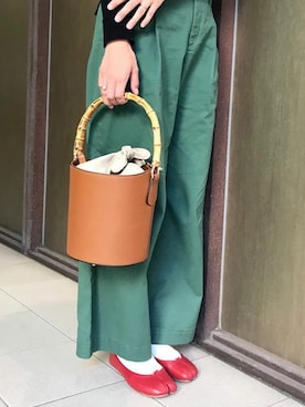 「アイテム（ショルダーバッグ、イエロー系）」を使った、nano・universe lady's webeditorさん（レディース・167cm）の冬コーディネート