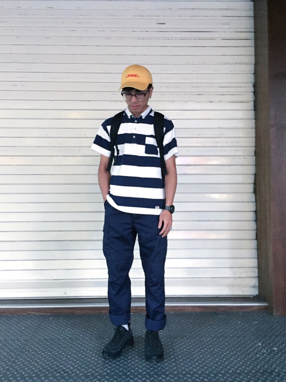 「ootd、outfit、street、streetstyle、POLO、ROTHCO、NIKE、hat、blue」｜「OUR PRIDEのアイテム（ポロシャツ、ホワイト系）」を使った、Felixさん（メンズ・172cm）の春コーディネートの1枚目の写真