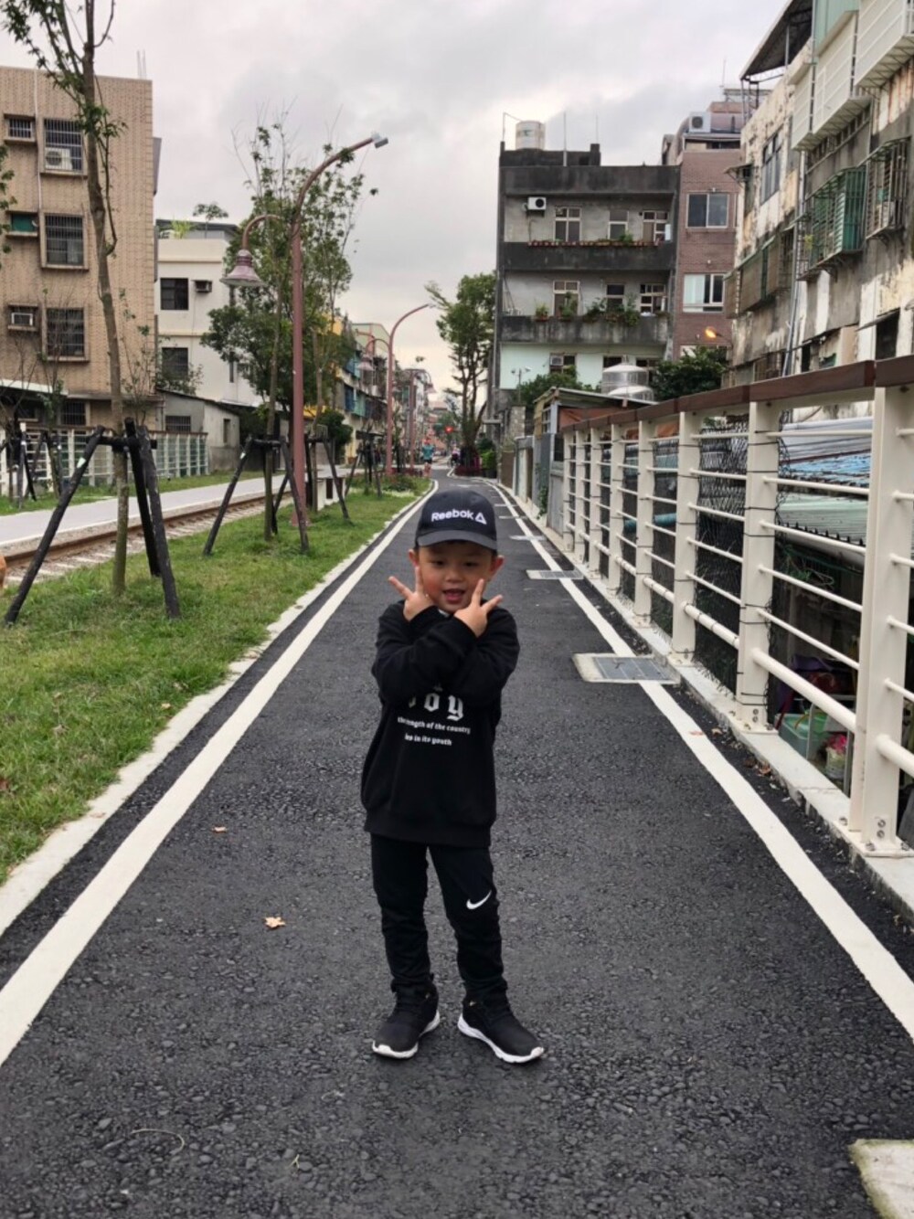 「Reebokのアイテム（キャップ、ブラック系）」を使った、hsuanlinさん（キッズ・110cm）の冬コーディネートの1枚目の写真
