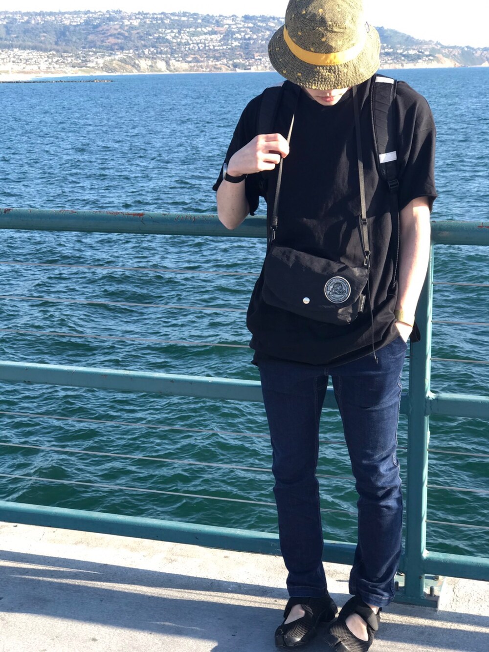「スキニーデニム、GRAMICCI、NIKE、リュック、Tシャツ、ハット、patagonia、ISSEY MIYAKE、nibi、アメリカ」｜「NIKEのNIKE AIR RIFT BREEZE【SP】（スニーカー、ブラック系）」を使った、ししさん（メンズ・173cm）の夏コーディネートの1枚目の写真