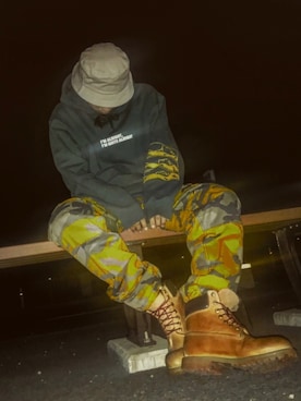 「アイテム（カーゴパンツ、イエロー系）」を使った、りょおみさん（メンズ・170cm）の冬コーディネート