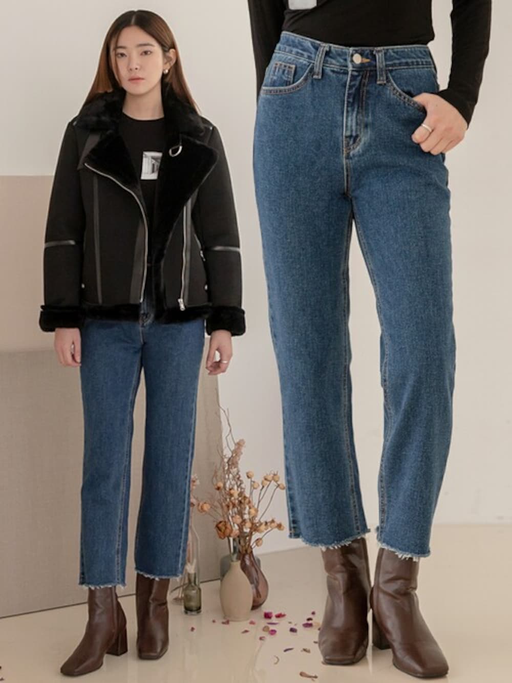 ブルー系のデニムパンツ、ブラック系のテーラードジャケットを着用したレディースの冬コーディネートの1枚目の写真