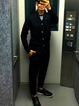 Elevator Boy is wearing CODY SANDERSON