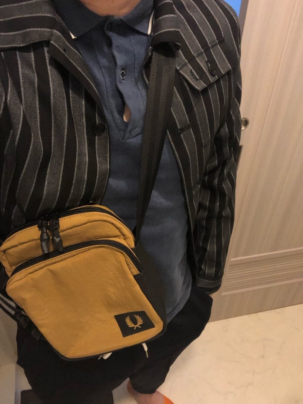 「FRED PERRY」｜「FRED PERRYのアイテム（ブルゾン、グレー系）」を使った、かいさん（メンズ・180cm）の春コーディネートの1枚目の写真