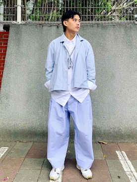 「SHINYAKOZUKA（シンヤコヅカ）のアイテム（チノパンツ）」を使った、Eason liang さん（メンズ・177cm）の冬コーディネート
