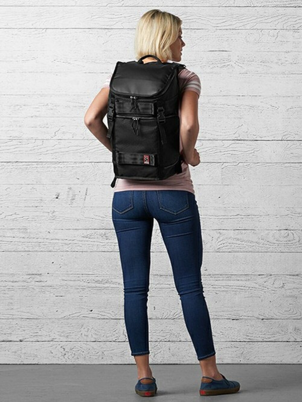 ブラック系のバックパック/リュックを着用したレディースの冬コーディネートの1枚目の写真