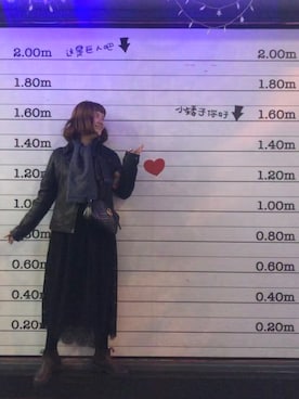 「Hollister（ホリスター）のアイテム（ライダースジャケット、ブラック系）」を使った、Jocelyn Chenさん（レディース）の冬コーディネート