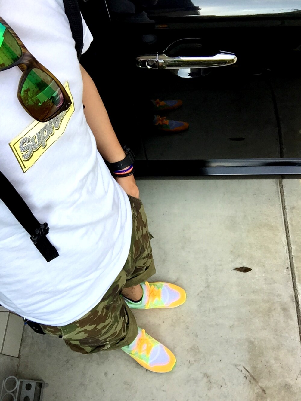 「supreme、NIKE」｜「NIKEのNIKE AIR HUARACHE LIGHT（スニーカー、オレンジ系）」を使った、ちゃぴおさん（メンズ・170cm）の夏コーディネートの1枚目の写真
