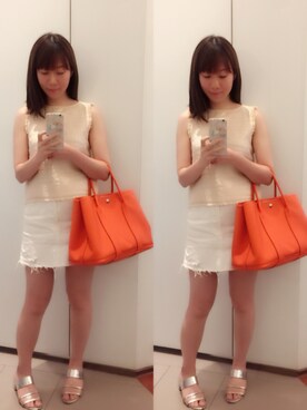 Hermes エルメス のトートバッグ オレンジ系 を使った人気ファッションコーディネート 髪型 セミロングヘアー Wear