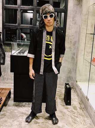Ethan Chu is wearing VINTAGE